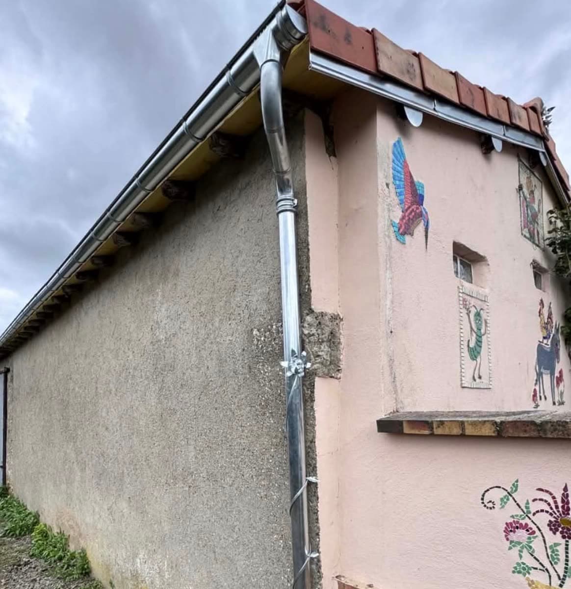 Gouttière et descente en zinc